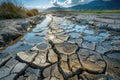 Dried Riverbed Landscape, Cracked Bottom with Small Puddles, Global Warming Concept Royalty Free Stock Photo