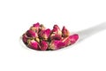 Dried rose buds on spoon Royalty Free Stock Photo