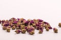 Dried rose petal flower on isolate white background.Blurred close up dried roses flower tea on white background. Royalty Free Stock Photo