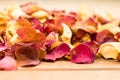 Dried Rose Petals Spread on a Wooden Surface Royalty Free Stock Photo