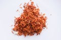 Dried safflower for herbal tea on white background, dry safflower petals, Saffron substitute Royalty Free Stock Photo