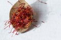Dried saffron spice in a spoon, copy space Royalty Free Stock Photo