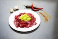 Dried salted bresaola beef thinly sliced on a plate, appetizers plate of Bresaola