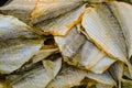 Dried salted yellow-striped selar. Salty fish snack
