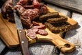 Dried sausage, home made dried sausage, very tasty food, sausage with bread. Village life, tasty village food. Royalty Free Stock Photo