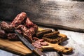 Dried sausage, home made dried sausage, very tasty food, sausage with bread. Village life, tasty village food. Royalty Free Stock Photo