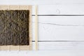 Dried seaweed, chopsticks and makisu Royalty Free Stock Photo