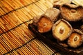 Dried Shiitake Mushroom on mat earth tone Royalty Free Stock Photo