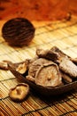 Dried Shiitake Mushroom on mat earth tone Royalty Free Stock Photo