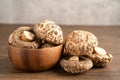 Dried shiitake mushroom in wooden bowl, healthy food Royalty Free Stock Photo