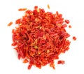 Dried sliced red hot chili peppers, isolated on white background, top view Royalty Free Stock Photo