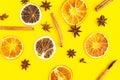 slices citrus and star anise pattern on bright yellow background