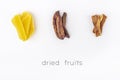 Dried slices of mango, bananas and melon. Organic homemade dry fruit chips in a paper eco pack on white. Healthy vegan snack. The