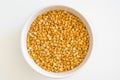 Dried split yellow chickpeas, known as chana dal, on a plain background Royalty Free Stock Photo