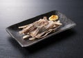 Dried squid and mayonnaise placed on a wooden background