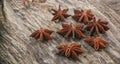 Dried star anises on a wooden surface