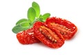 Dried or Sundried tomato halves with sweet  basil isolated Royalty Free Stock Photo