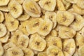 Dried sweet banana chips close up full frame