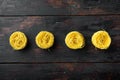 Dried taglierini , on old dark  wooden table , top view flat lay, with copy space for text Royalty Free Stock Photo