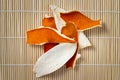 Dried tangerine peel on bamboo background