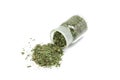 Dried tarragon leaves in a glass bottle Royalty Free Stock Photo