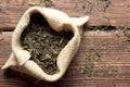 Dried tea leaves in jute bag Royalty Free Stock Photo