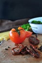 Dried Tomato and Fresh Tomato on Cutting Board Royalty Free Stock Photo