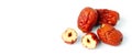 Dried unabi fruit or jujube with sliced on white background. Chinese dried red date fruit.