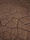 Dried up cracked earth dry cracks ground in Valley of the moon Valle de la luna near San Pedro de Atacama desert Chile