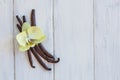 Dried vanilla pods on wooden background. Vanilla copy space Royalty Free Stock Photo