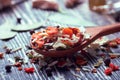 Dried vegetables in a wooden spoon