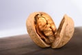 Dried walnut close up on wooden table Royalty Free Stock Photo