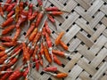 Dried Whole Chili on Bamboo weave texture