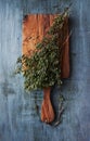 Dried wild oregano on a kitchen board Royalty Free Stock Photo