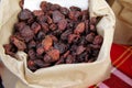 Dried wild strawberries. Dry fruits in paper bag