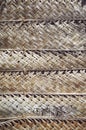 Dried woven palm leaf wall, natural background Royalty Free Stock Photo