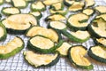 Dried zucchini slices isolated on white background