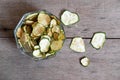 Dried zucchini in a wood bowl