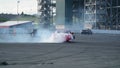 Racing car drift with smoking tyres Royalty Free Stock Photo