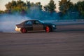 The drift car enters the turn at high speed. Motor sports