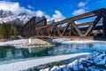 Drift ice floating on Bow River in early winter season sunny day morning. Canmore, Alberta, Canada. Royalty Free Stock Photo