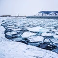 Drift Ice. Pancake ice is formed in the river. Royalty Free Stock Photo