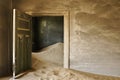 Drifted sand in abandoned building, Namibia
