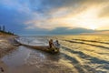 Driftwood on a Lake Huron Beach at Sunset Royalty Free Stock Photo