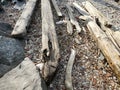 Driftwood and rubbish on a stoney beach, Manhattan, New York. Royalty Free Stock Photo