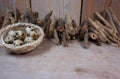 Driftwood and quail eggs on wooden background Royalty Free Stock Photo