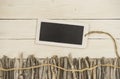 Driftwood and a tablet decorated on a white wood backbround Royalty Free Stock Photo