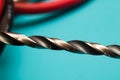 Drill bit close up on blue background Royalty Free Stock Photo