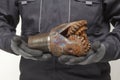 Drill bit in hands Royalty Free Stock Photo