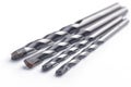 Drill bits made from Titanium isolated over white background. Drill bits of different sizes.set of working tools Royalty Free Stock Photo